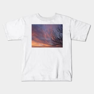 Fluffy Clouds at sunset Kids T-Shirt